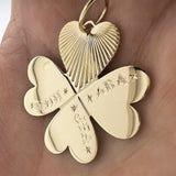 14K yellow gold clover pendant engraved with names