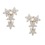 A pair of 14K gold and diamond ear climber earrings with a multi-stone floral cluster design, displayed on a clean white background.