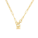 A gold paperclip chain necklace featuring a small padlock pendant with a pavé diamond accent on the shackle, set against a plain white background.