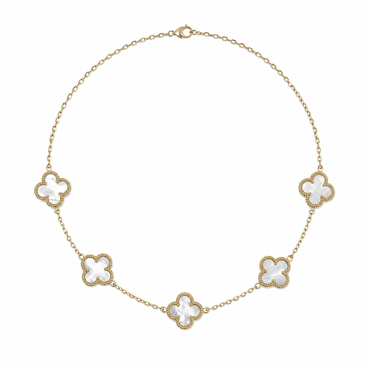 Mother of Pearl Clovers with 14k yg beaded detailing on a white background