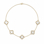 Mother of Pearl Clovers with 14k yg beaded detailing on a white background