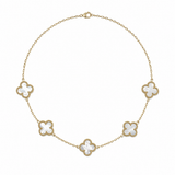 Mother of Pearl Clovers with 14k yg beaded detailing on a white background