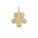 Gold flower-shaped pendant with embedded diamonds on a white background