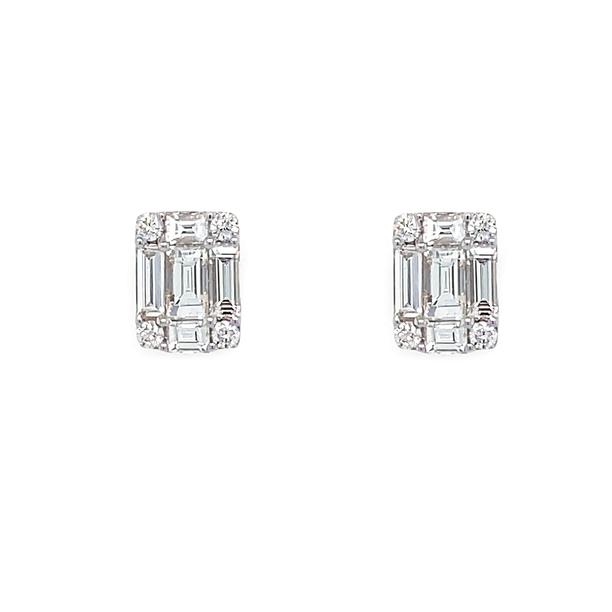 Pair of emerald-cut diamond earrings on a white background