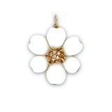 A 14K yellow gold pendant with a white coral flower design and diamond accents.