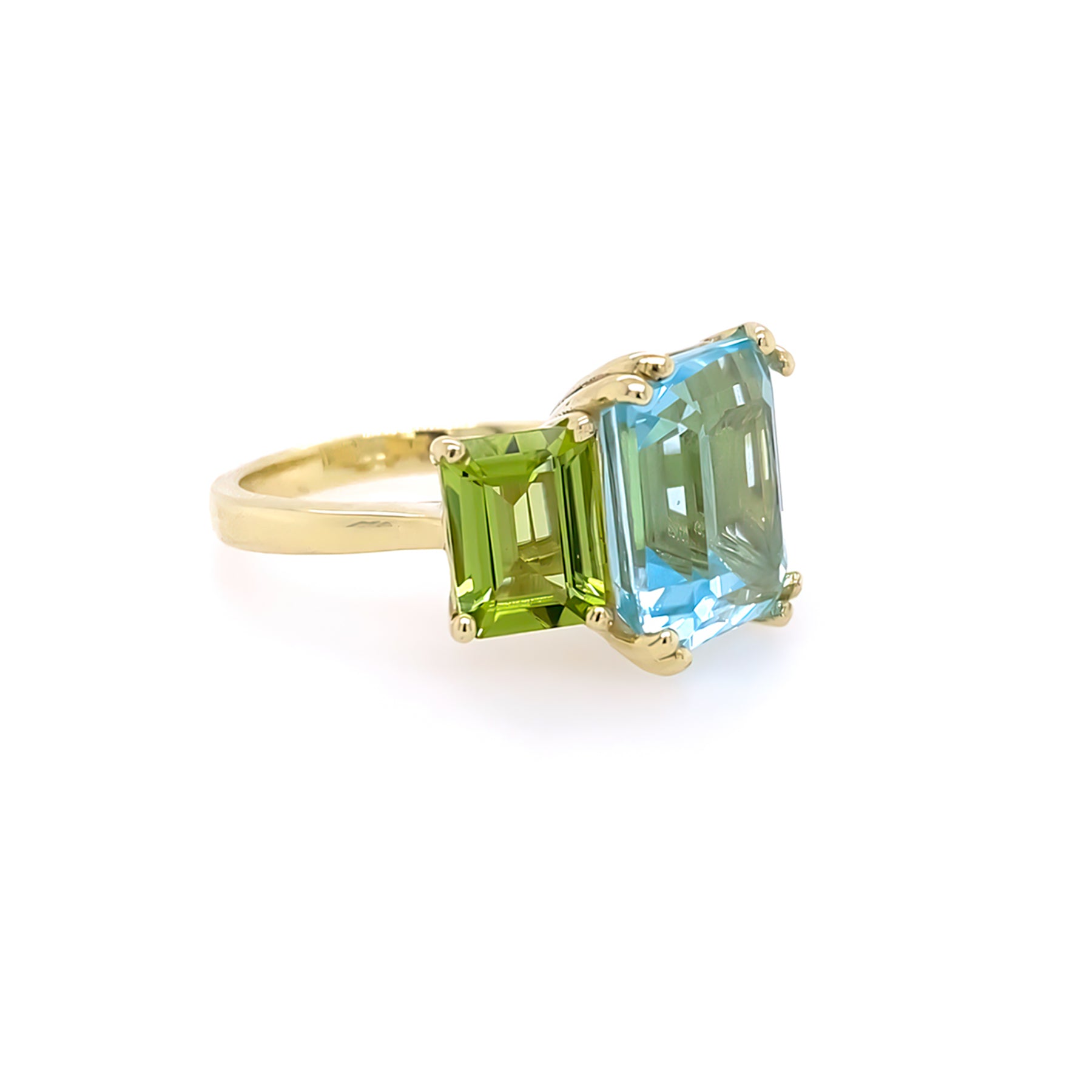 14K Gold ring with green amethyst and blue topaz gemstones on a white background