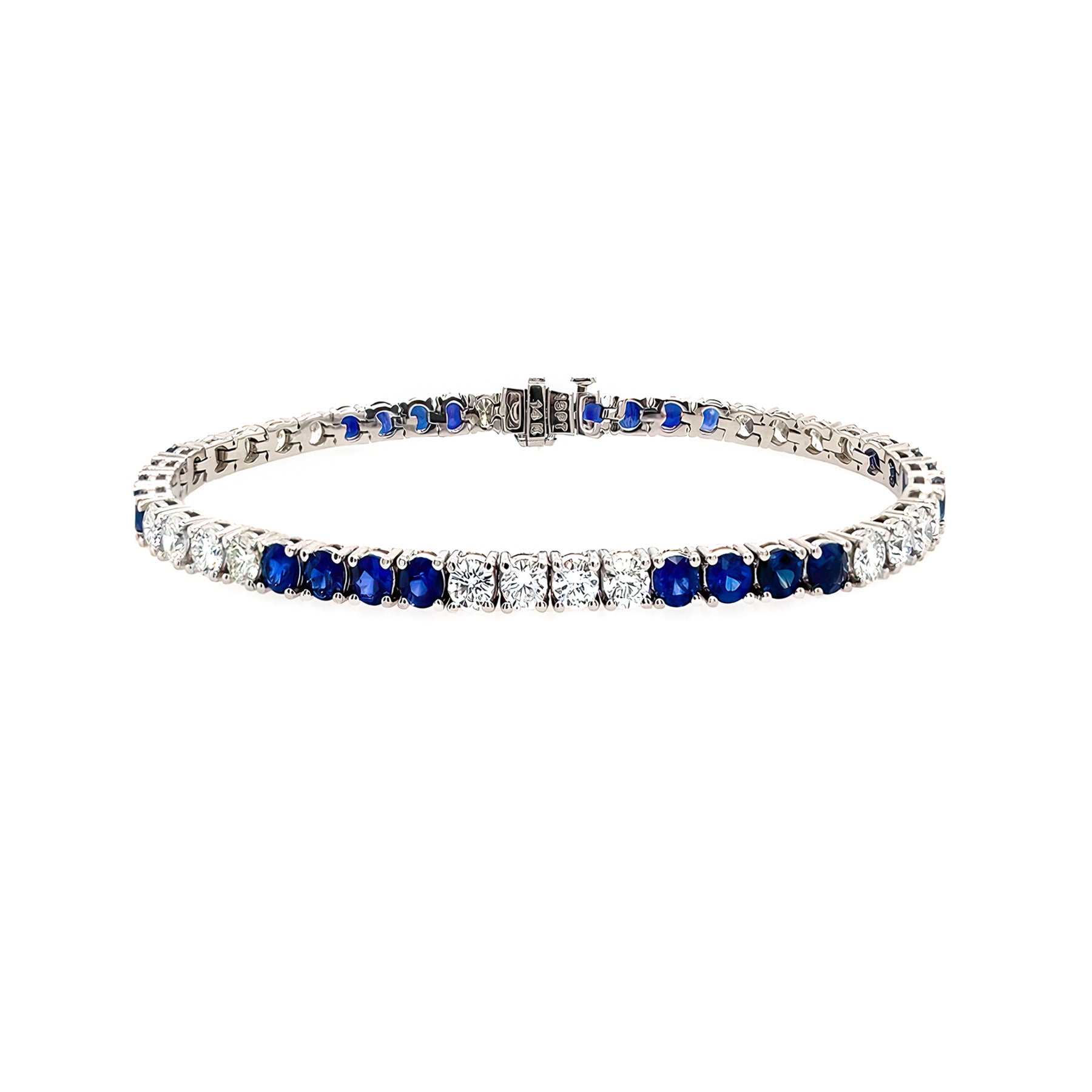 Bracelet with blue sapphire gemstones and diamonds on a white background