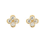 A pair of 14K yellow gold clover diamond earrings with four clear diamond stones set in gold.
