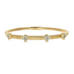 14K Gold bracelet with clover-shaped diamond designs on a white background