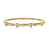 14K Gold bracelet with clover-shaped diamond designs on a white background