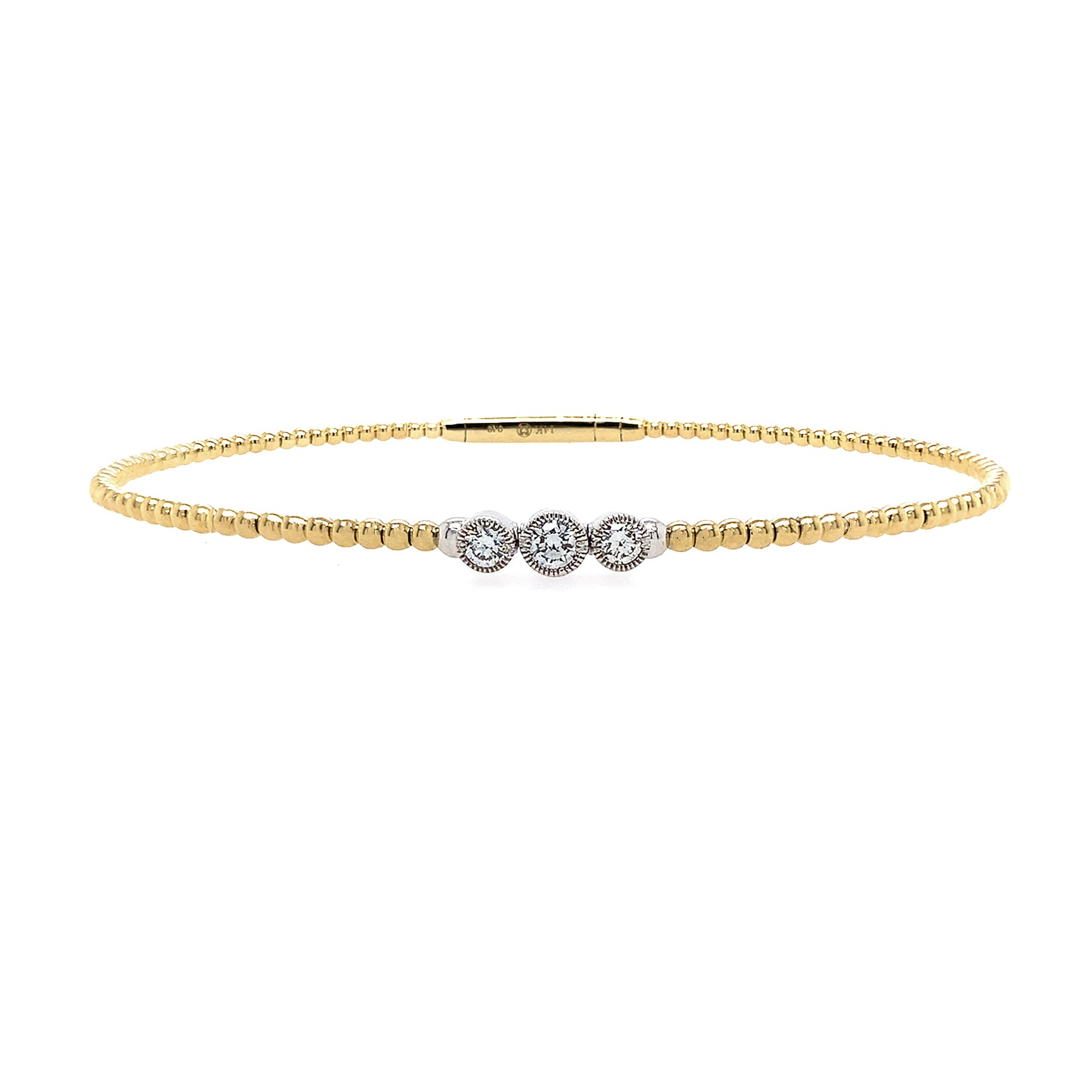 14K Gold bracelet with three bezel diamonds on a white background