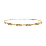 14K Gold beaded bracelet with diamond bar stations on a white background