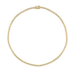 A 14K yellow gold tennis necklace with a small repeating row of clear diamonds all around, shown on a plain white background.