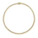 A 14K yellow gold tennis necklace featuring a continuous row of bezel-set clear diamonds, arranged in a circular shape on a solid white background.