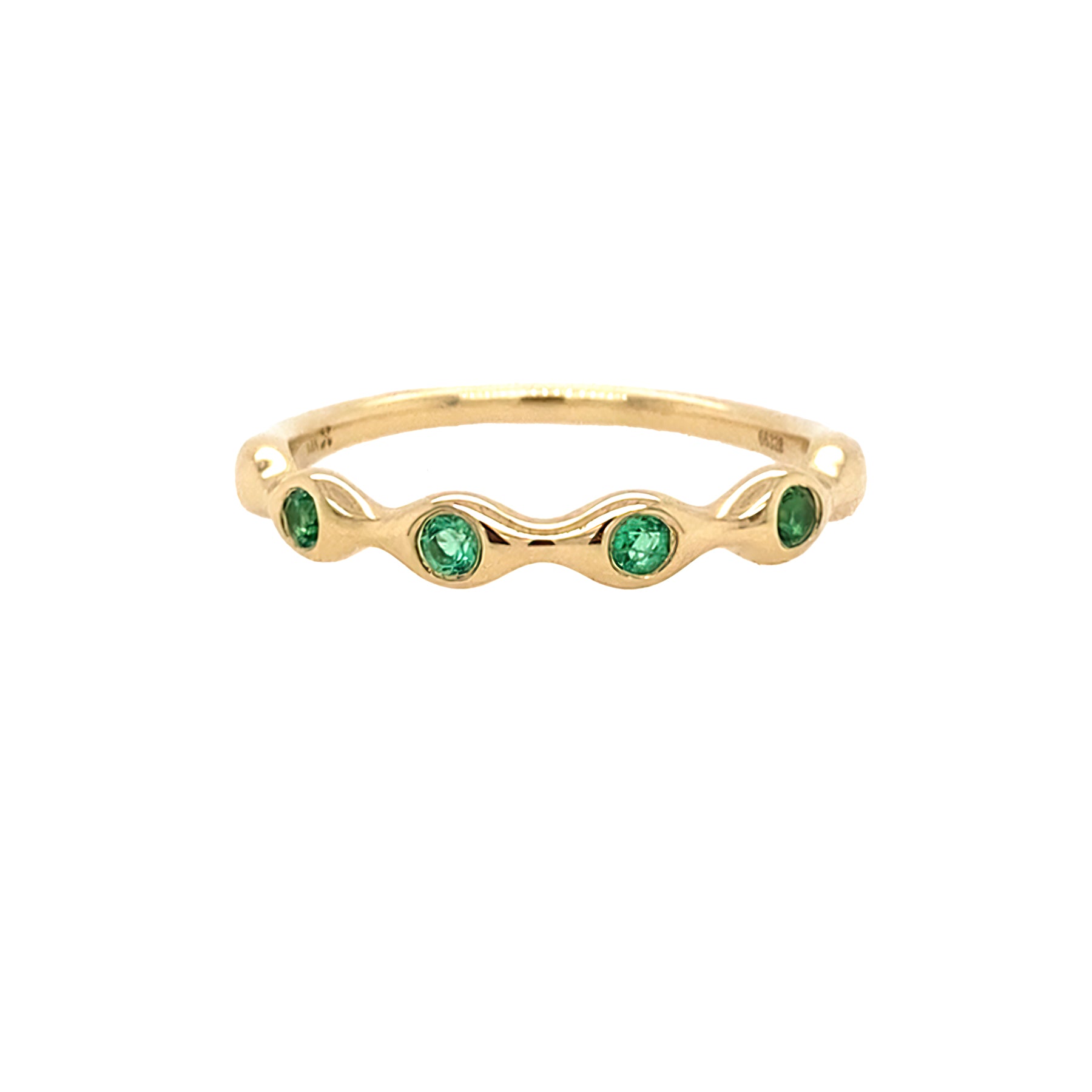 14K Gold ring with emerald stones on a white background