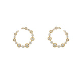 Gold hoop earrings with diamond accents on a white background