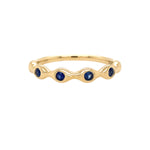 14K Gold ring with sapphire gemstones on a white background