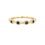 14K Gold ring with sapphire gemstones on a white background