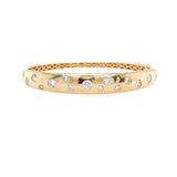 14K Gold bracelet with scattered diamond stones on a white background