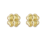 A pair of 14K yellow gold clover earrings with diamond accents.