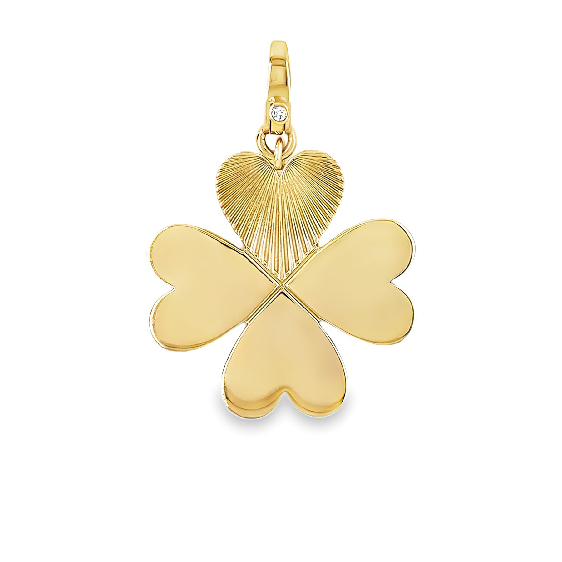 A 14K yellow gold clover pendant with a diamond enhancer 