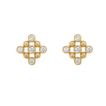 14K gold earrings with bezel diamond stones on a white background