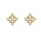 14K gold earrings with bezel diamond stones on a white background