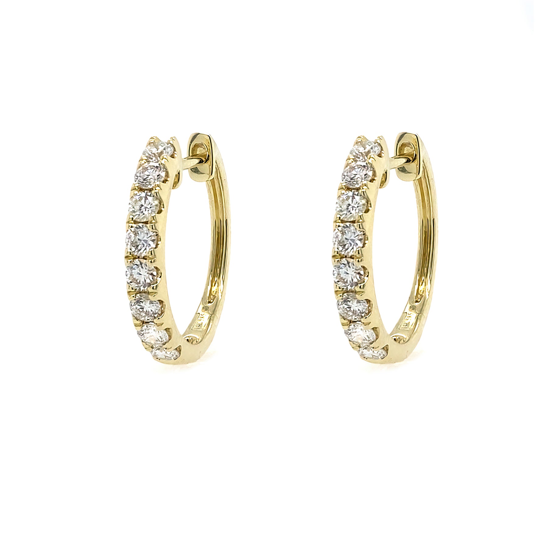 Gold hoop earrings with diamonds on a white background