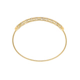 side view of 14k Gold stretch bracelet with a white background