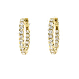 14K Gold hoop earrings with diamond accents on a white background