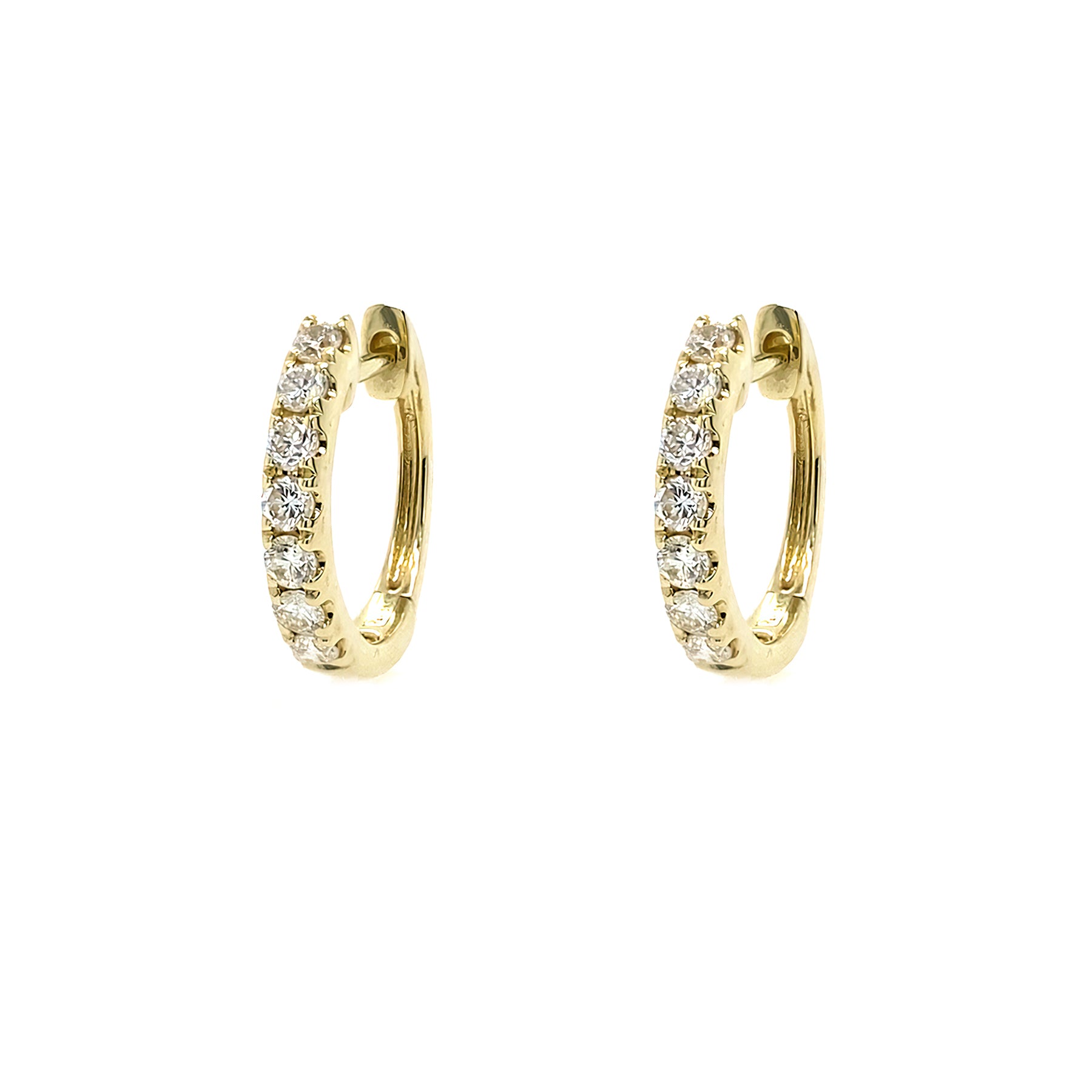 Gold hoop earrings with diamonds on a white background