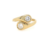 14K Gold ring with two diamonds on a white background