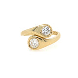 14K Gold ring with two diamonds on a white background