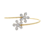 14K Gold beaded bracelet with flower-shaped diamonds on a white background 