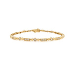 A 14K yellow gold bracelet with mixed shape diamonds.