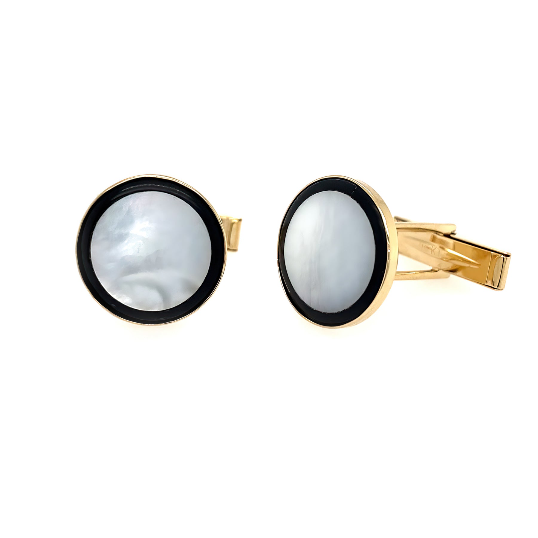 A pair of 14K yellow gold cufflinks with mother of pearl and onyx inlays.