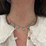 14K yellow gold natural turquoise necklace on model