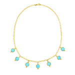 14K Yellow Gold necklace with turquoise stones on a white background