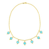 14K Yellow Gold necklace with turquoise stones on a white background