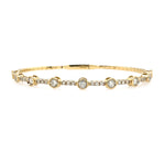 14K Gold bracelet with diamonds on a white background