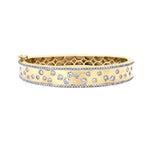 14K Gold bracelet with scattered Diamonds on a white background