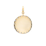 A 14K yellow gold disc pendant with scattered diamonds along the perimeter.