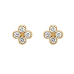 14K Gold and diamond clover-shaped earrings on a white background