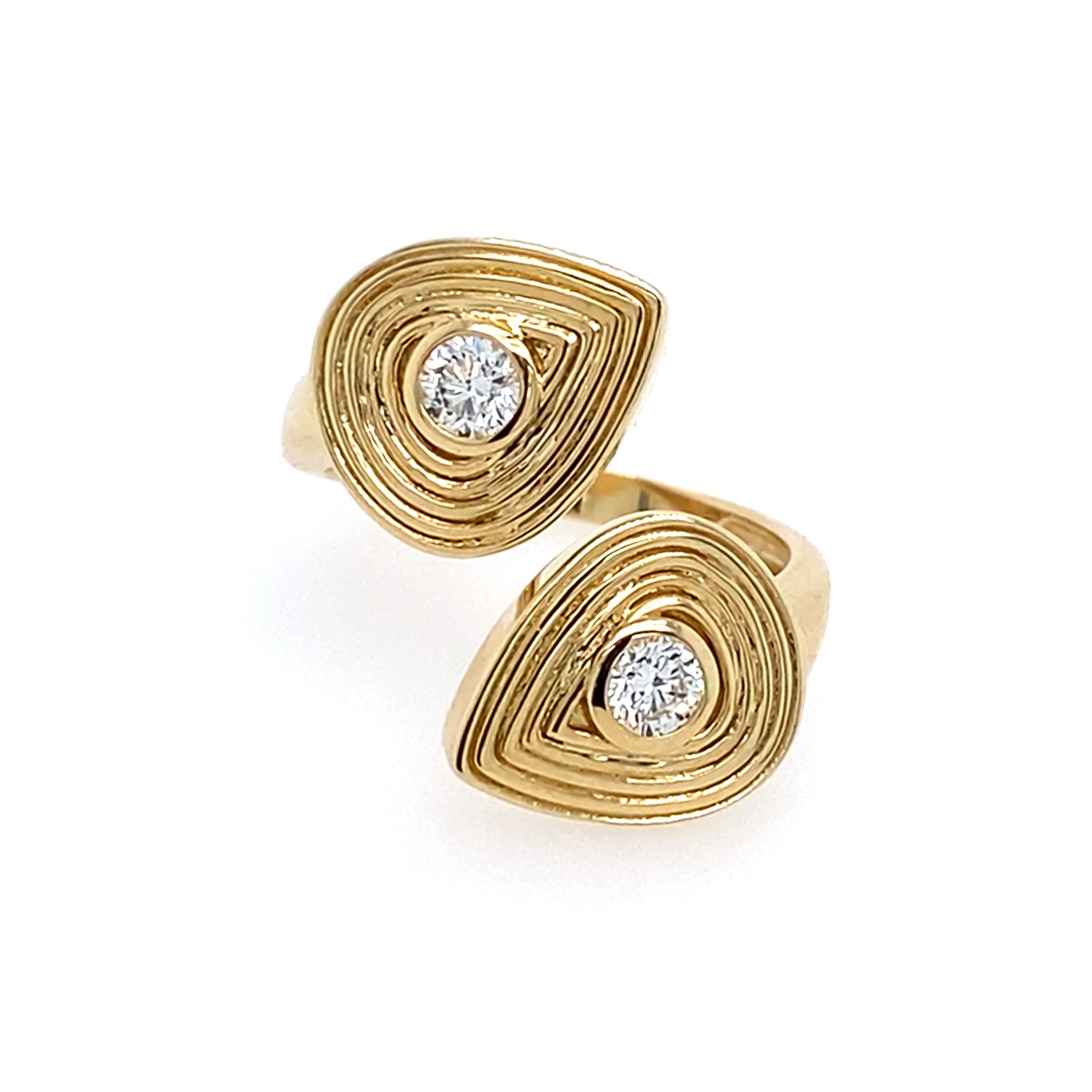 14K Gold ring with diamond centers on a white background