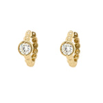 14K Gold huggie hoop earrings with a Single Bezel Diamond