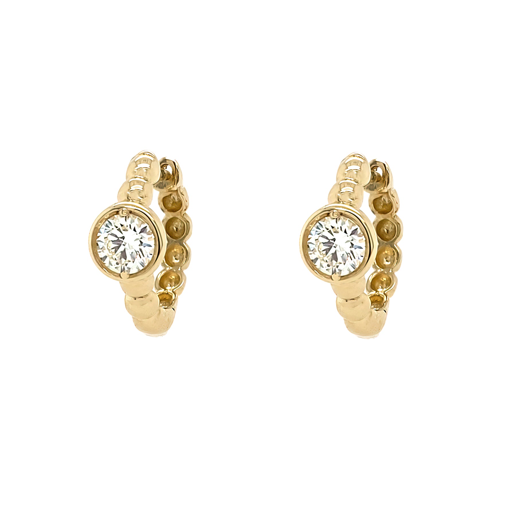 14K Gold huggie hoop earrings with a Single Bezel Diamond