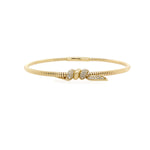 14K Gold bracelet with a knot-shaped diamond design on a white background