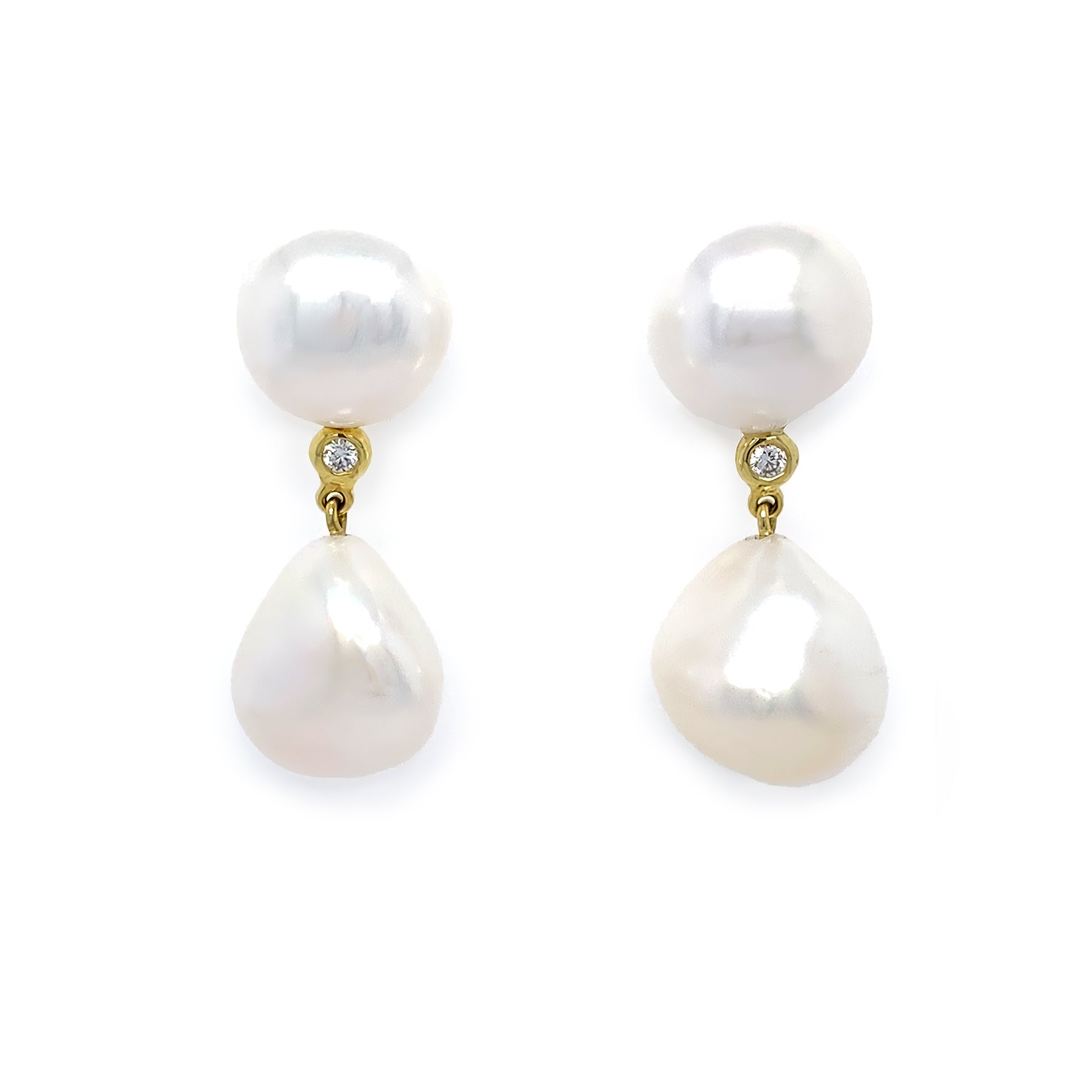 14k yellow gold double pearl drop earrings with diamonds in between