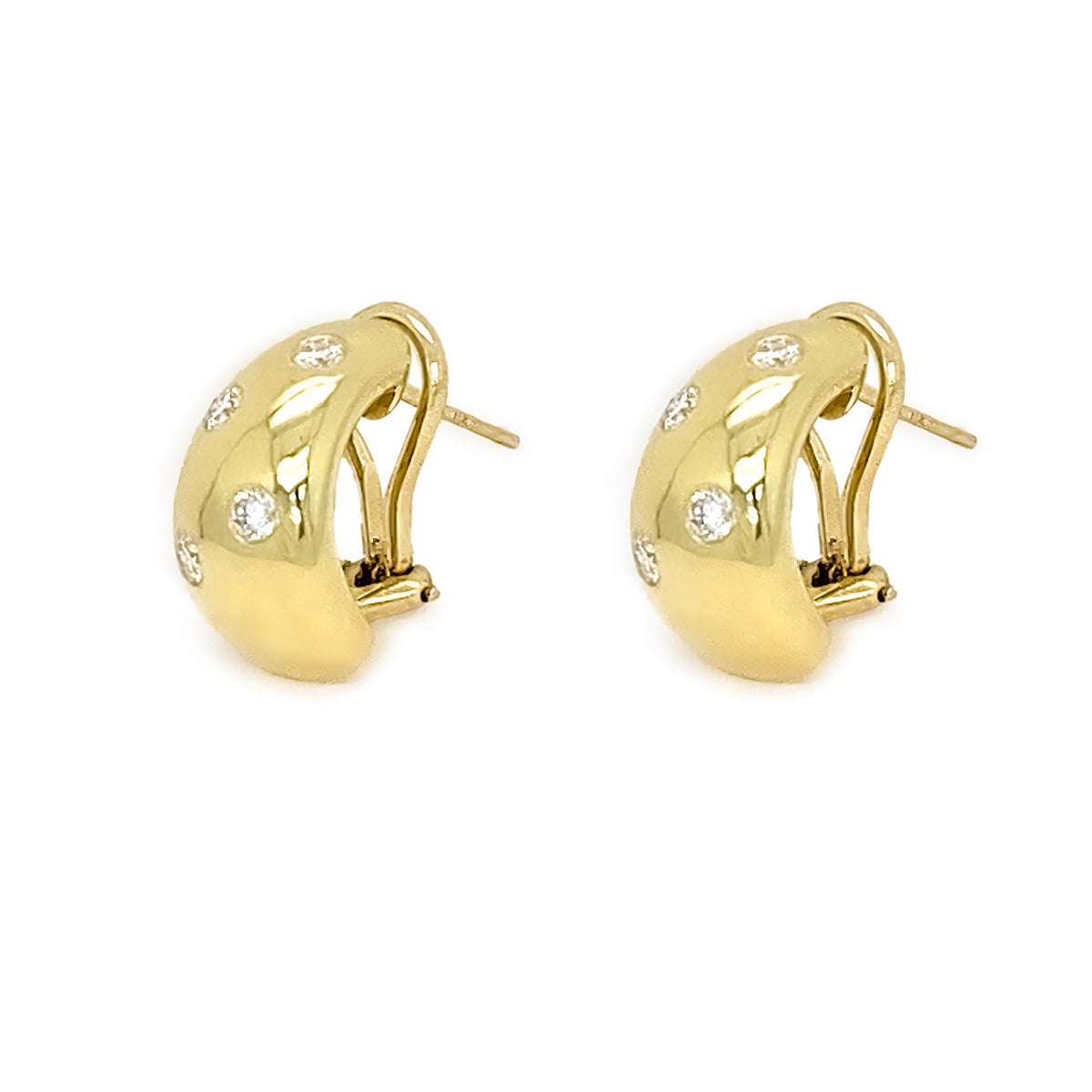 Gold hoop earrings with small diamonds on a white background