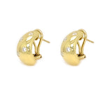 Gold hoop earrings with small diamonds on a white background